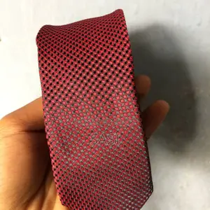 Perfect Gift Idea: A Timeless Red Tie That Matches Suit and Occasion.