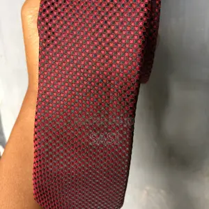 Perfect Gift Idea: A Timeless Red Tie That Matches Suit and Occasion.