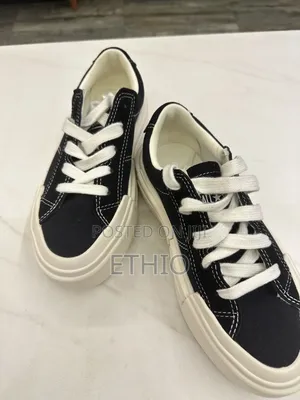 Converse Women's Chuck Taylor All Star Crui Ox Sneaker,Black
