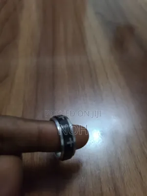 Ring Rotable Cross Figure