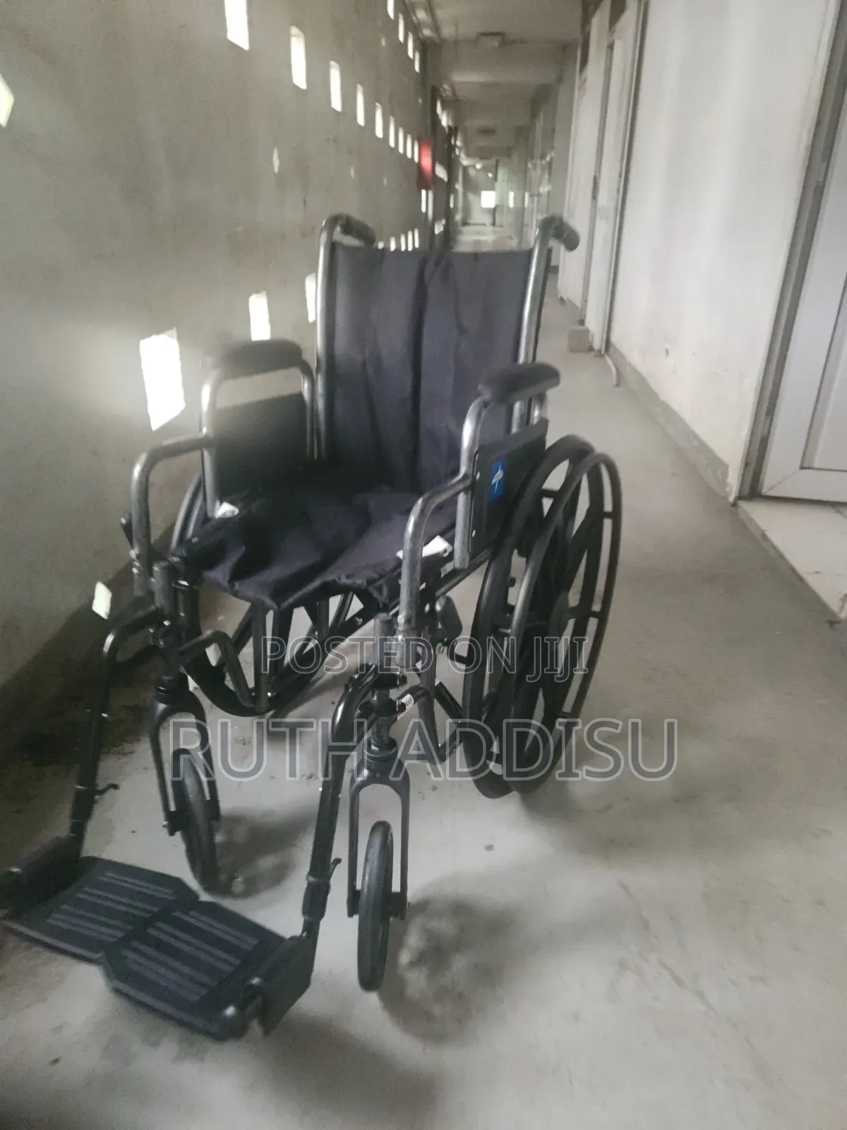 Manual Wheelchair Appears to Be a Sopur Easy 300 Model Wheelchair