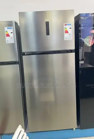 Midea Refrigerator Featuring a Top-Mount Freezer.Includes a Digital