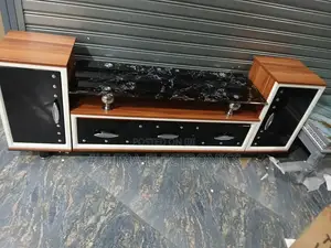 Tv Stand Features A Striking Black Marble-patterned Glass Top