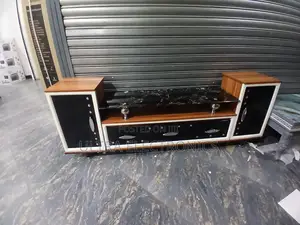 Tv Stand Features A Striking Black Marble-patterned Glass Top