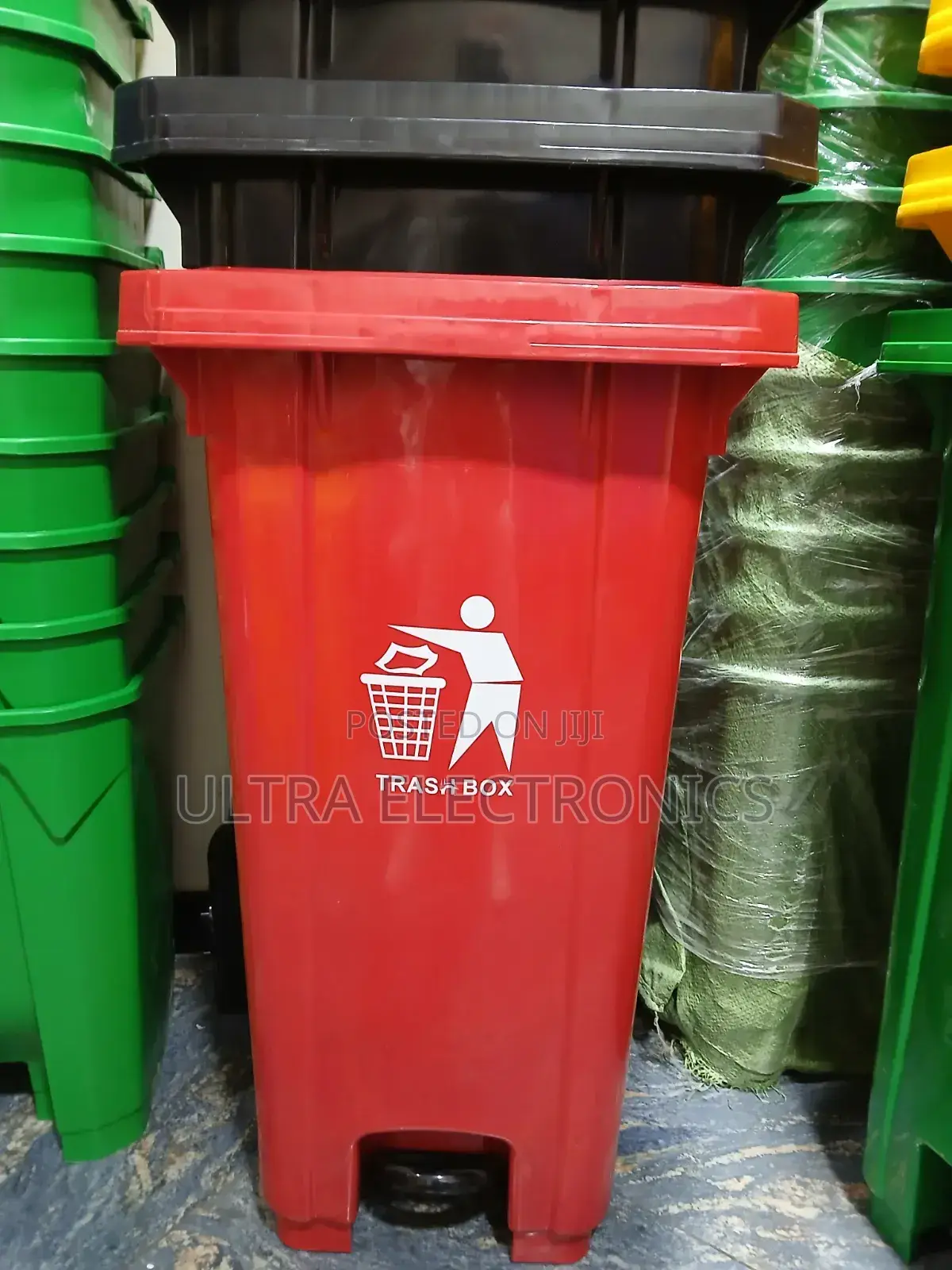 Garbage Red Plastic Trash Bin Features a Convenient Pedal-Operated