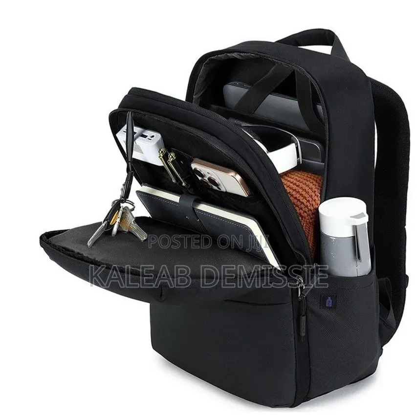 Green Lion Smithfield Laptop Backpack Features Black Laminated Leather