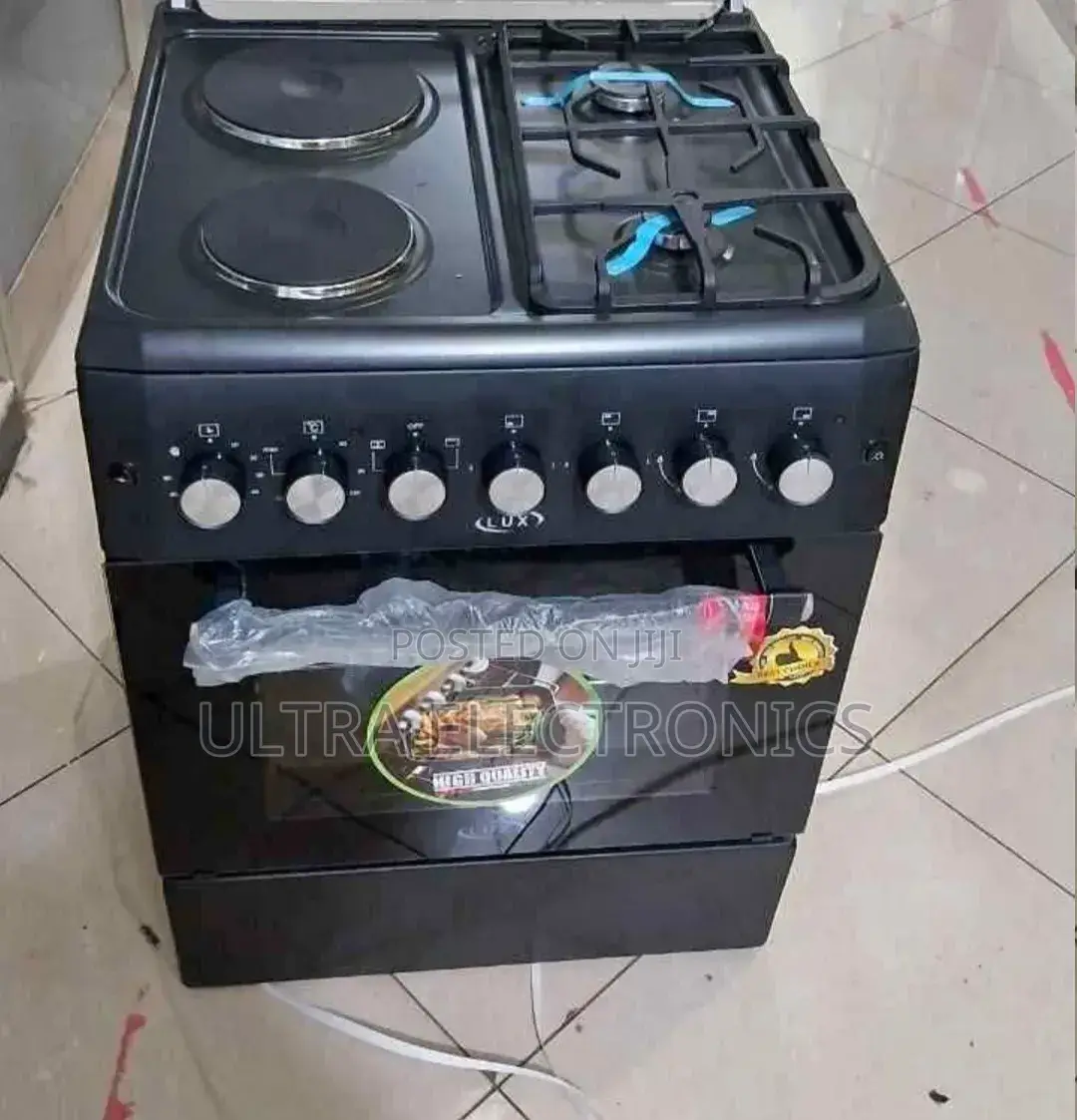 Lux Freestanding Oven 60x60cm Featuring Four Burners A Black Finish.