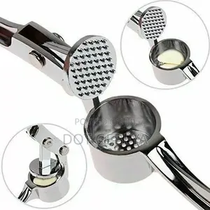 Stainless Steel Tool Is Designed to Crush Garlic and Kitchen Use.