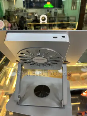 Heavy-Duty Aluminum 360° Rotating Laptop Stand With Cooling Fan