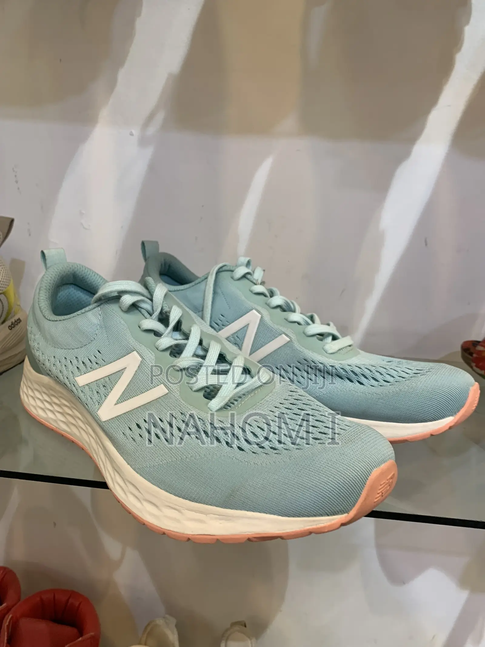 Adidas Astrastar Trainers Feature A Beige Mesh Upper With Bla