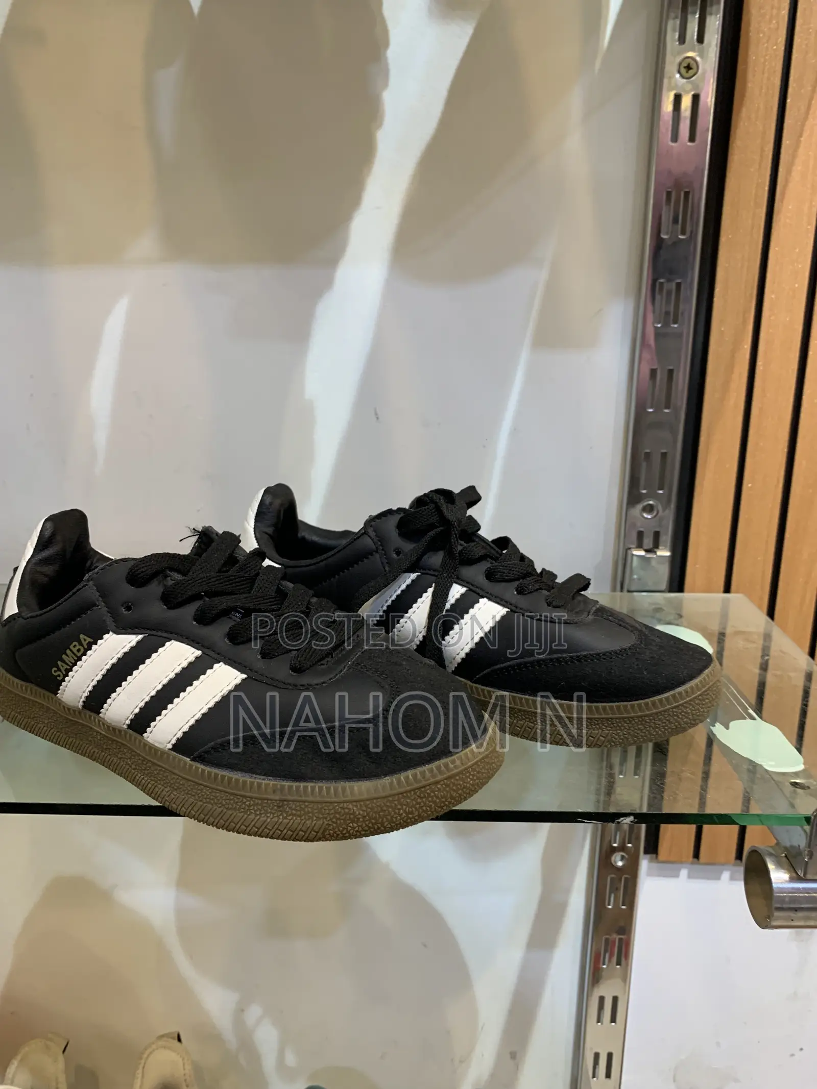 Adidas Astrastar Trainers Feature A Beige Mesh Upper With Bla