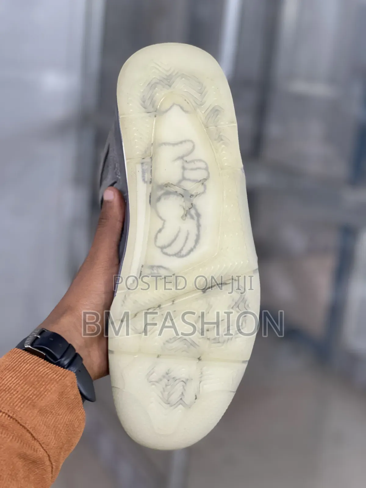 Kaws X Air Jordan 4: Premium Grey Suede