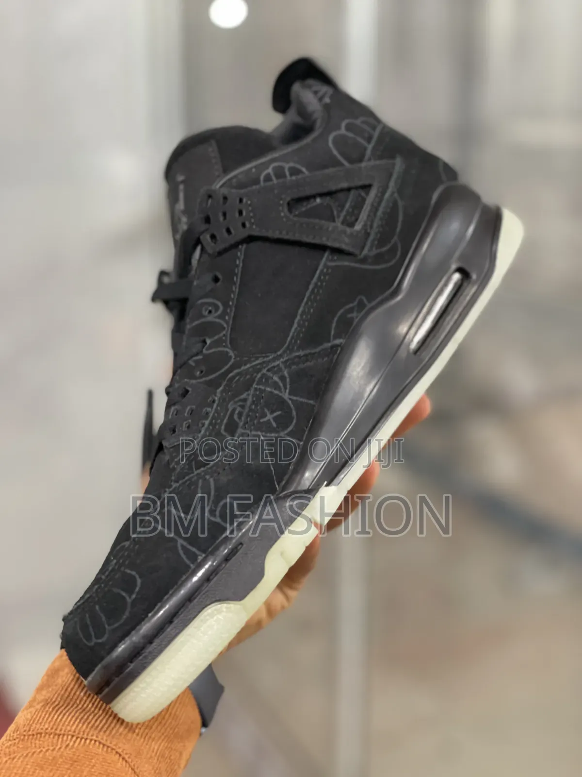 Kaws X Air Jordan 4: All Black