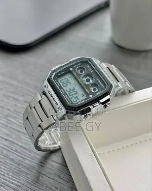 Casio *Features:-* • Digital Display: Shows Time, Date, and Day.