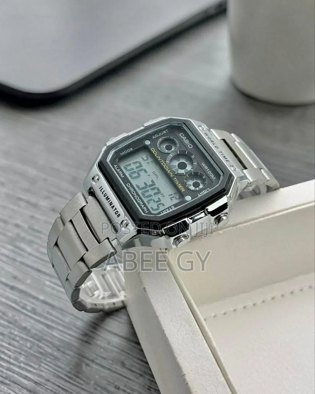 Casio *Features:-* • Digital Display: Shows Time, Date, and Day.