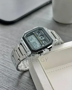 Casio *Features:-* • Digital Display: Shows Time, Date, and Day.