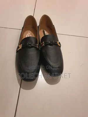 Black Leather Loafers Featuring