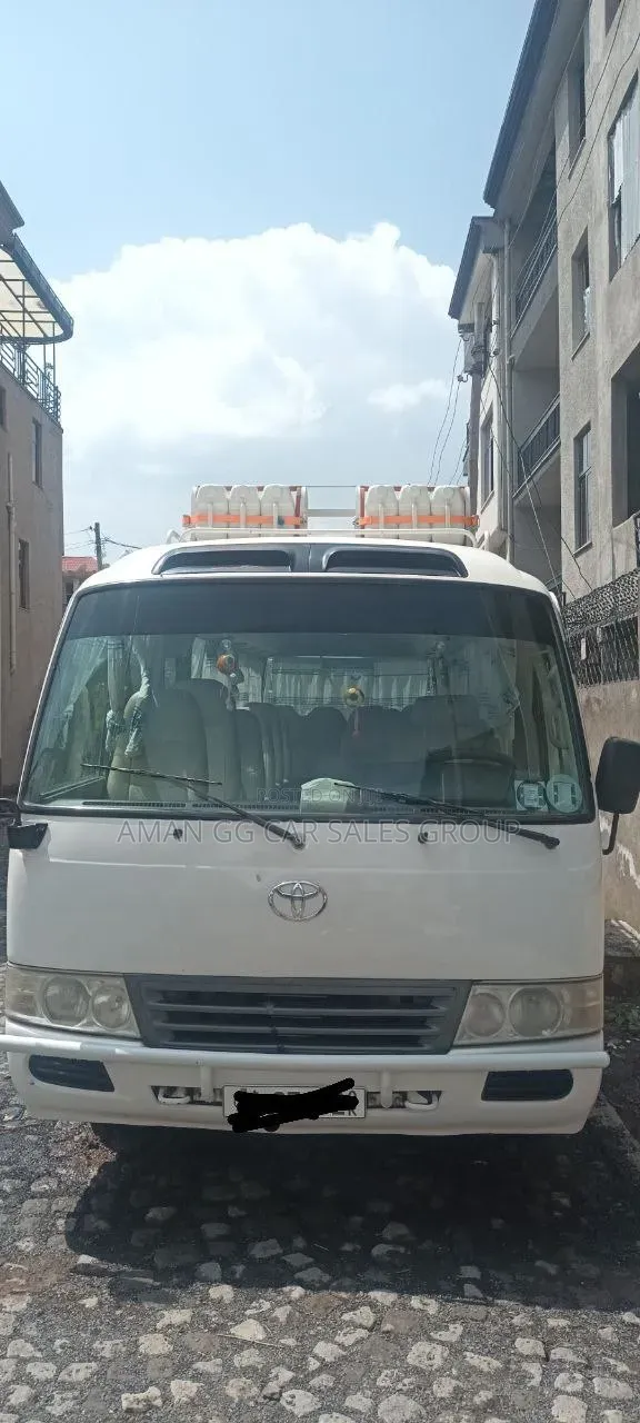 Toyota Coaster 2013 White