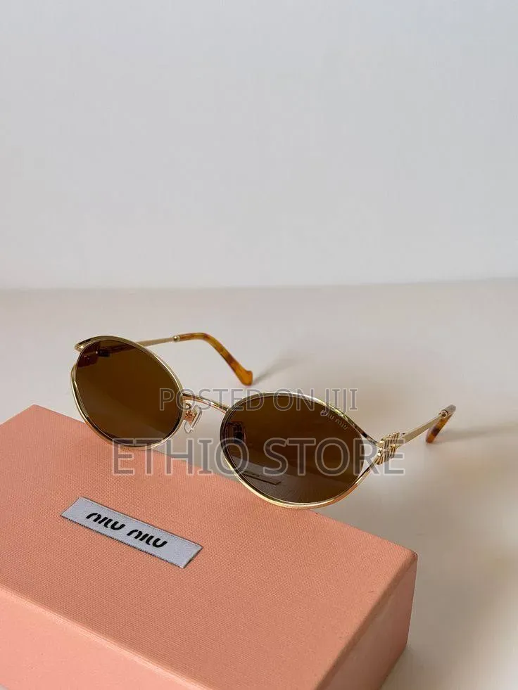 Miu Miu Sunglass in Brown