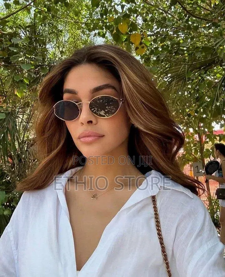 Miu Miu Sunglass in Brown