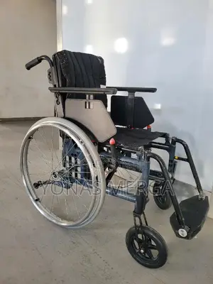 European Wheelchair血啓weighs Only 25 LBS With Footrests Removed.