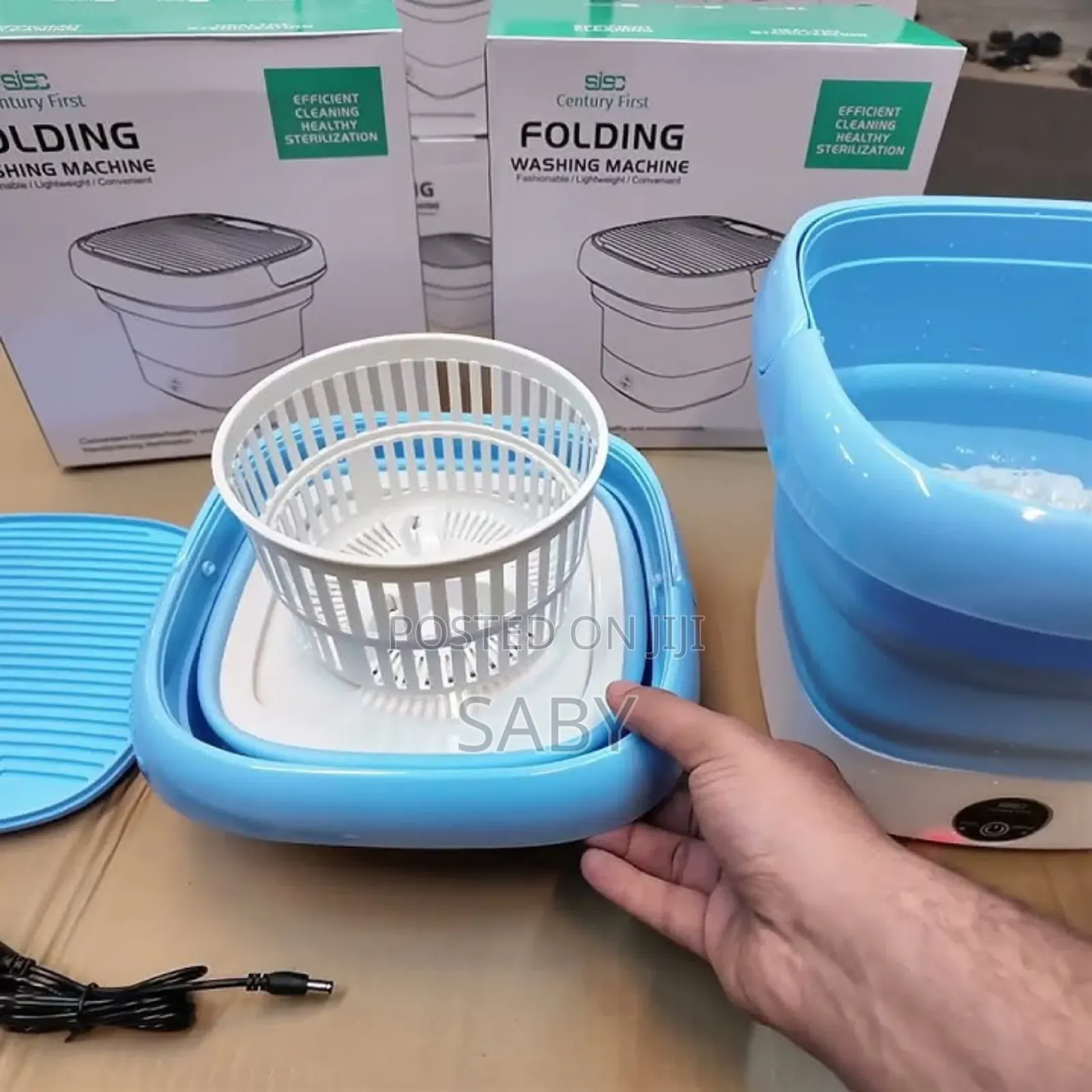 Folding Washing Machine Includes a White Spin-Dry Basket
