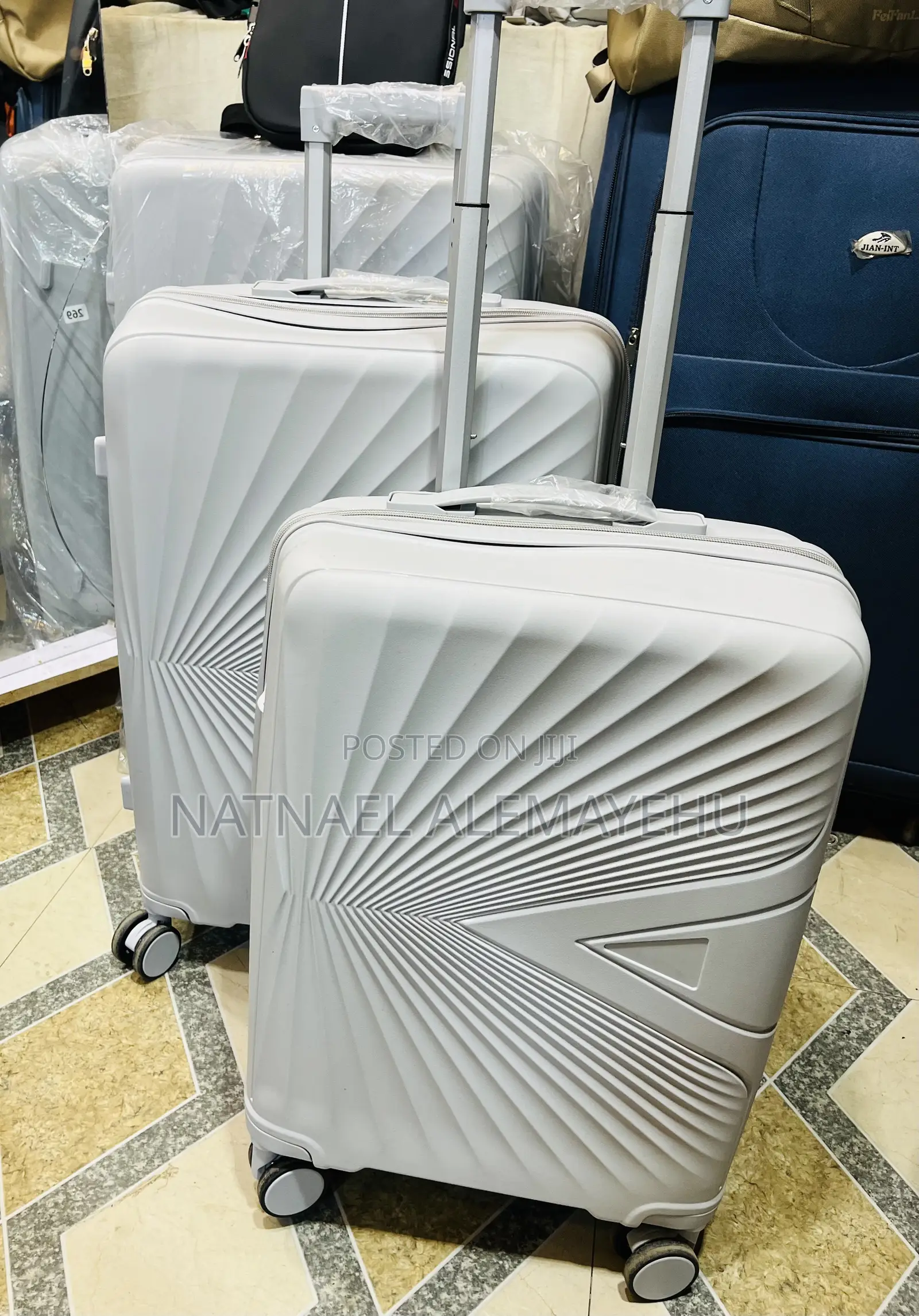 ሻንጣዋ Follow Me Luggage