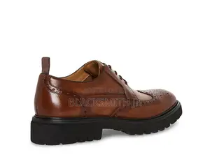 Emeri Mens Leather Wingtip Oxfords