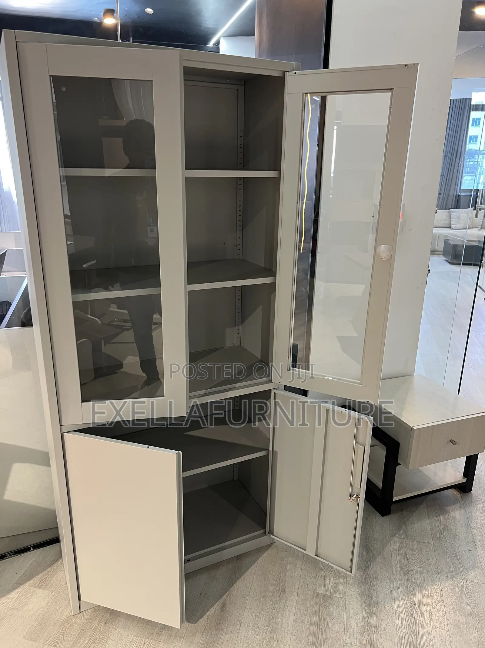 Metal Storage Cabinet With Glass Doors.