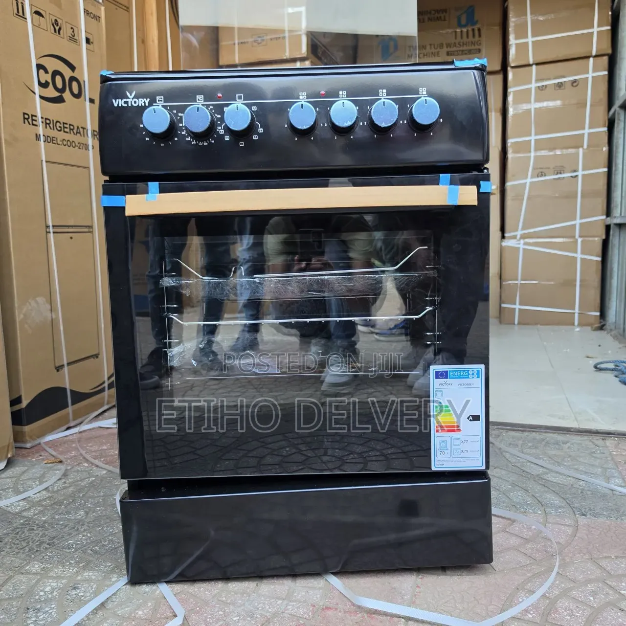 This Black Victory Freestanding Electric Cooker Features Four Hot Plat
