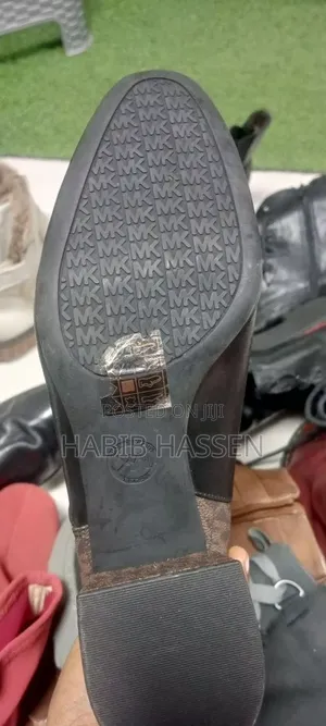 ከፍታ ያላቸዉ የሴቶች ባንዳ ጫማዎች