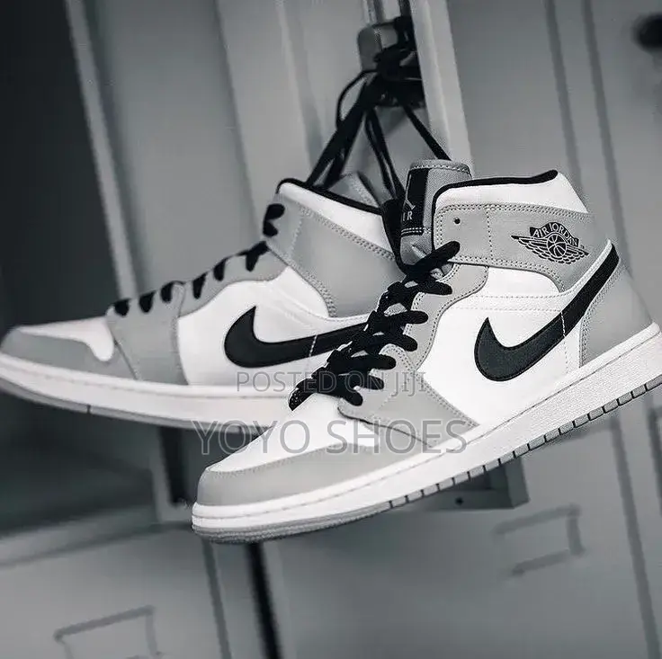 Nike Air Jordan 1 Mid Sneakers Light Smoke Grey, White, and Black