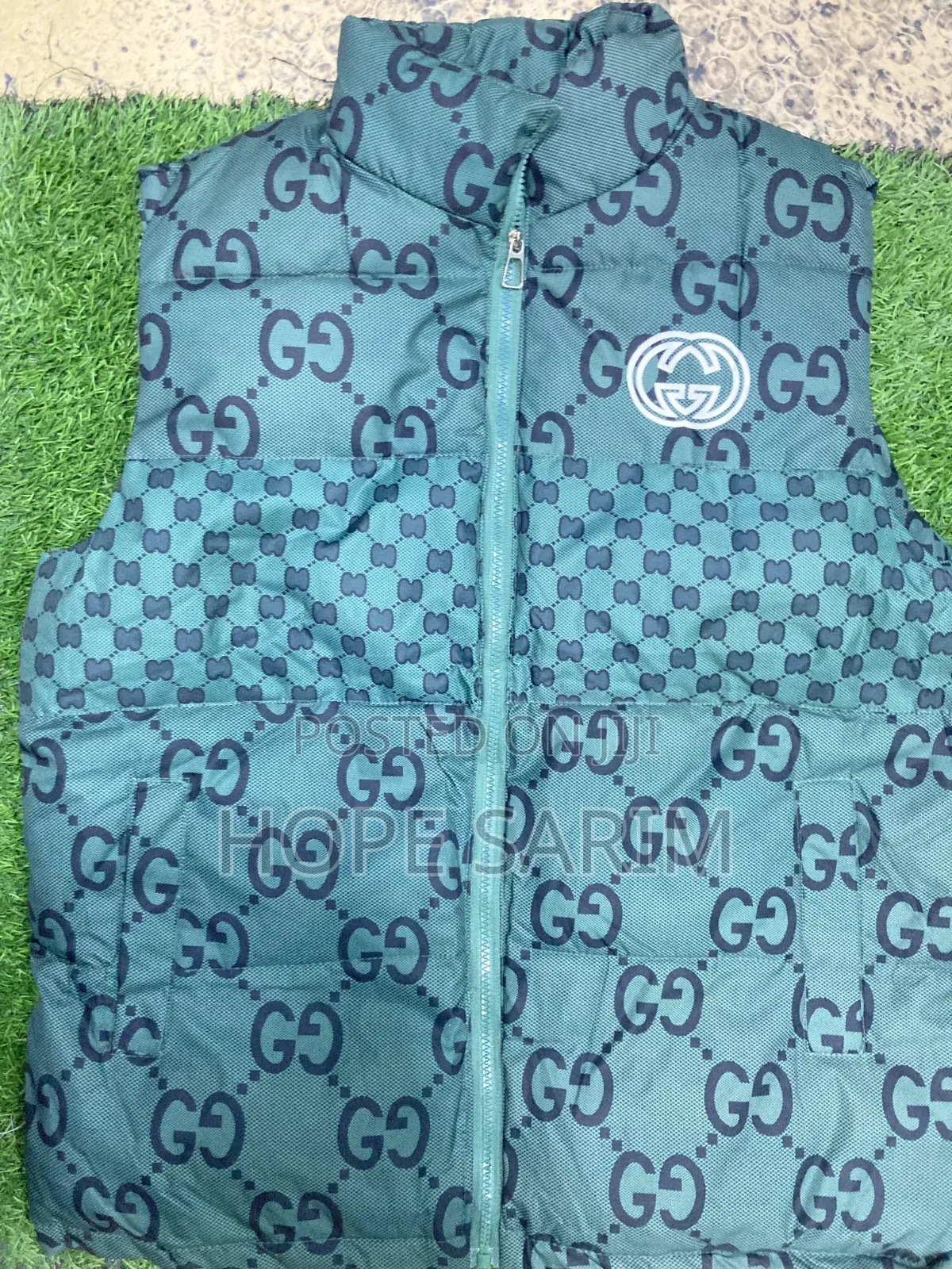 Gucci Monogram Puffer Vests:
