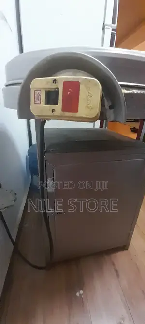 A Biret Mitad With a Box Underneath