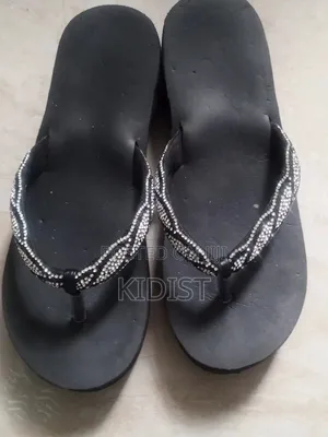 Slippers ለ ውጭ የ ሚሆን