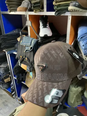 Premium Brown Monogram Metallic Badge Trucker Cap
•