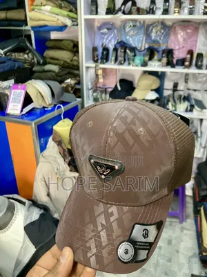 Premium Brown Monogram Metallic Badge Trucker Cap
•