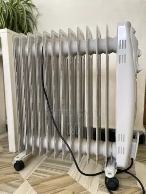 Comet Home Living Oil-Filled Radiator Room Heater (የቤት ማሞቂያ)