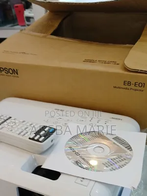 Brand New Epson Eb-E01 Projector With Cartoon