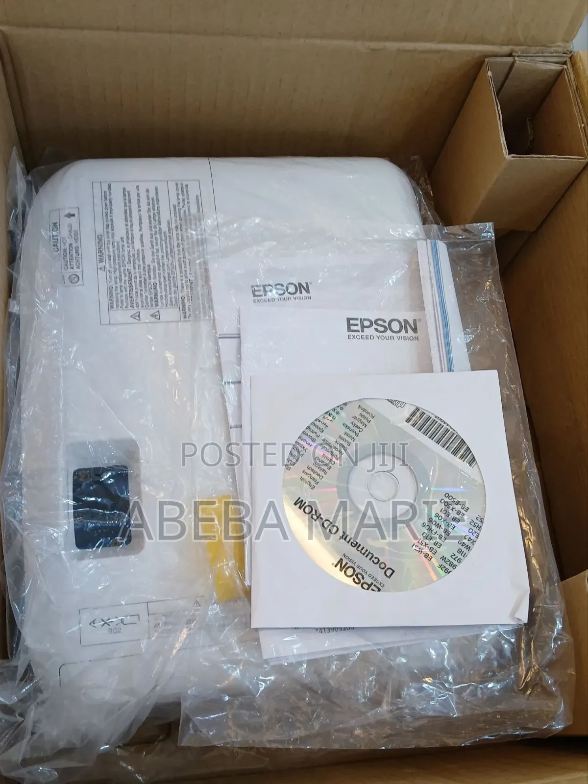 Brand New Epson Eb-E01 Projector With Cartoon