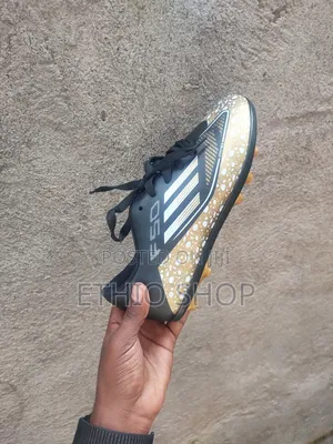 Kids Football Shoes,ታኬታ