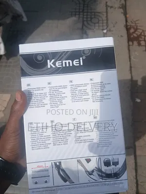 This Kemei Km-809a Professional Hair Clipper Features A White Cordless