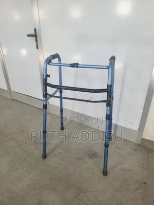Lightweight Aluminum Walker Features Adjustable Height Settings