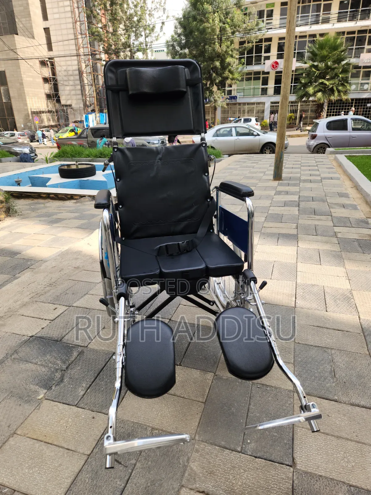 Wheelchair a Manual Reclining Commode Wheelchair Featuring a High