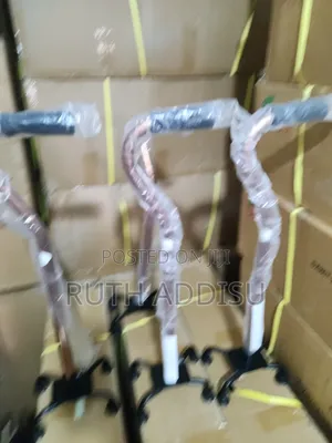 Adjustable Quad Walking Stick - Black From Essential Aids
ዊልቸር Cane