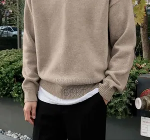 # Premium Men's Knitted Polo Sweater (ዘመናዊ የወንዶች ስዊተር)