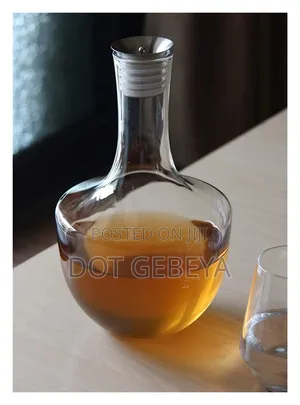 This Amber-Colored Decanter and Glass Set,