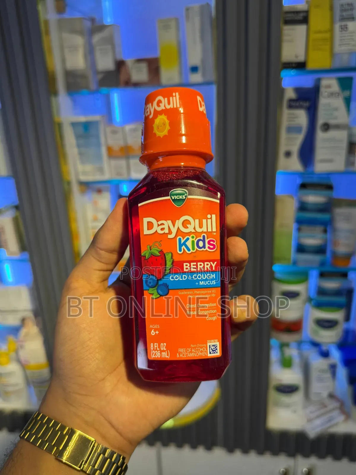 Vicks Dayquil Kids Berry Flavor Cold Cough + Mucus Relief Liquid.
