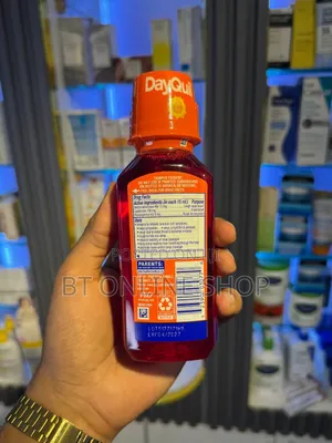Vicks Dayquil Kids Berry Flavor Cold Cough + Mucus Relief Liquid.