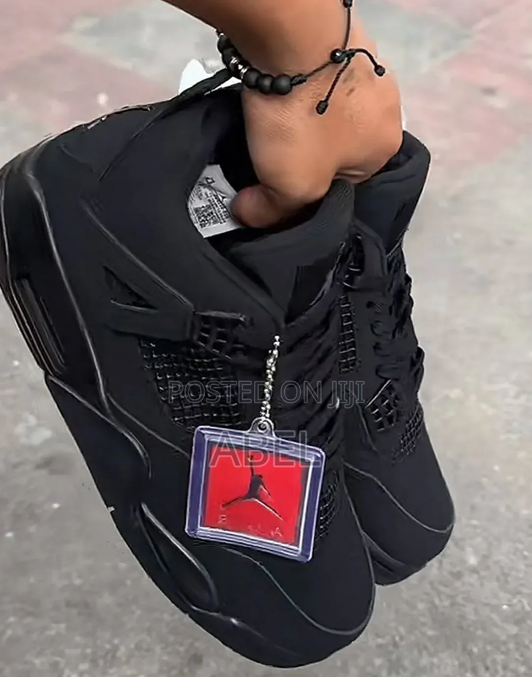 Air Jordan 4 Retro "Black Cat,"